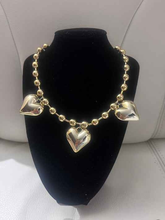 3 Corazones en Oro